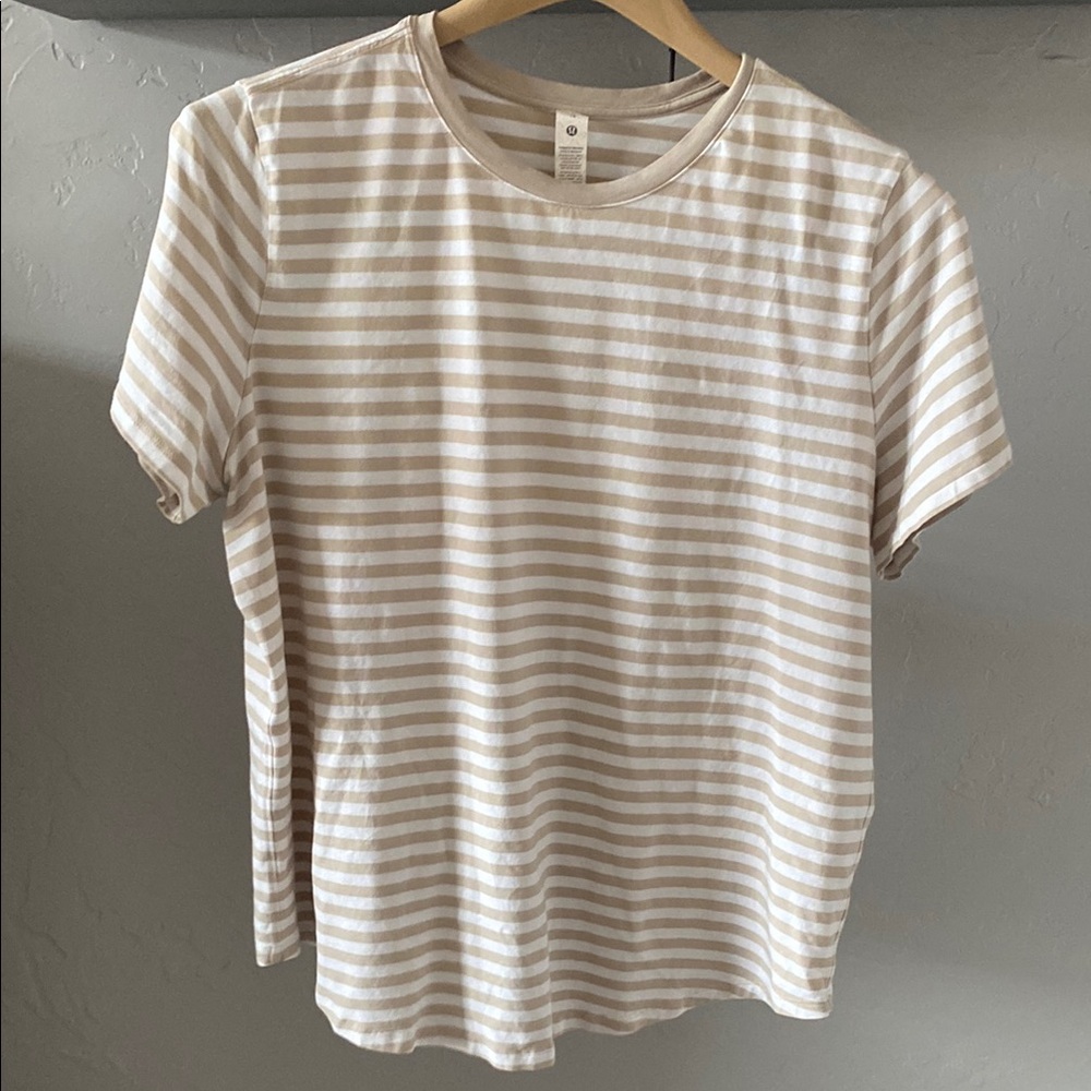 Size 16, Plus. Lululemon women’s Striped Beige and White T-Shirt